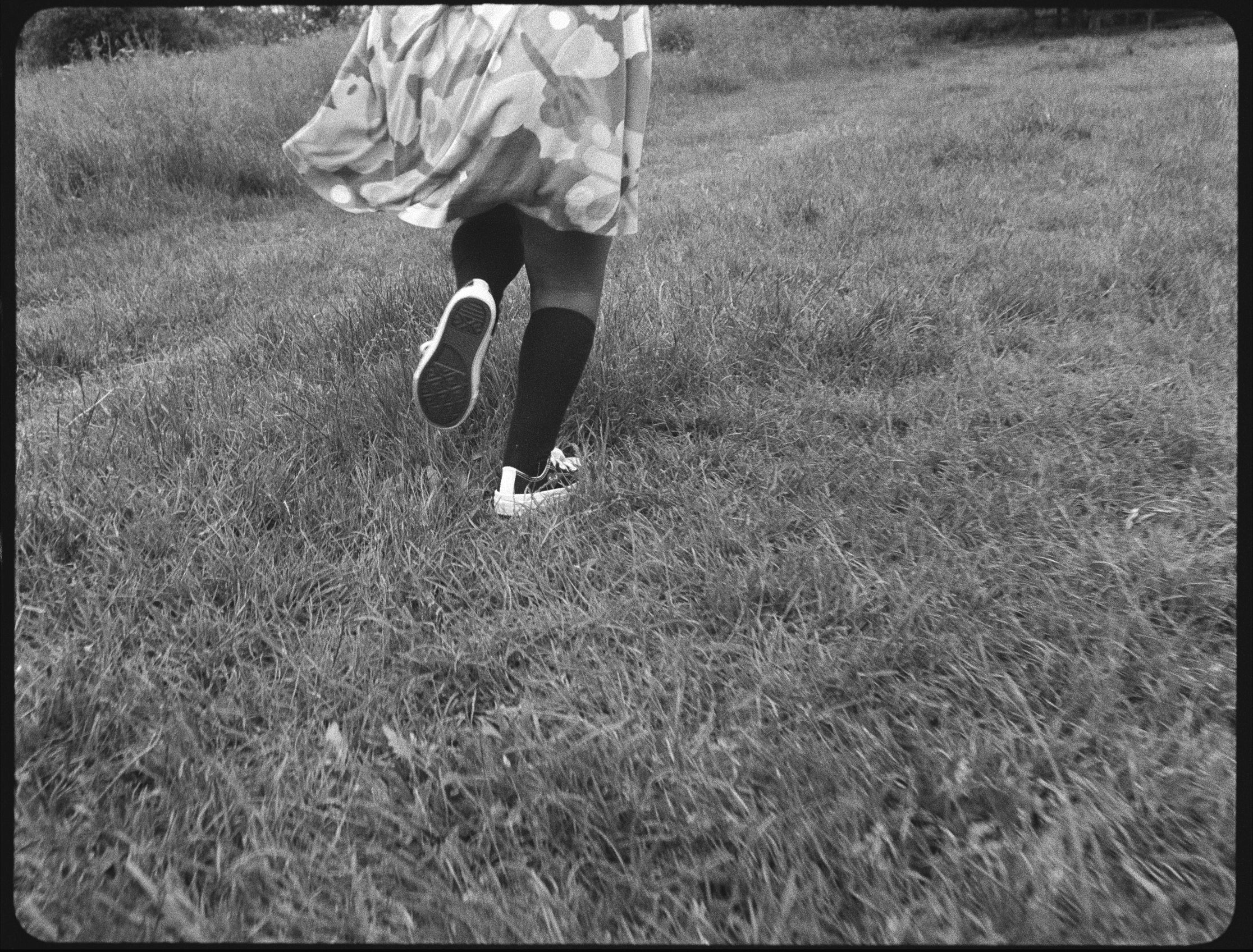 Fashion model wearing a Play Comme des Garçons x Converse outfit